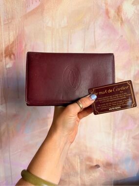 Cartier burgundy leather clutch wallet